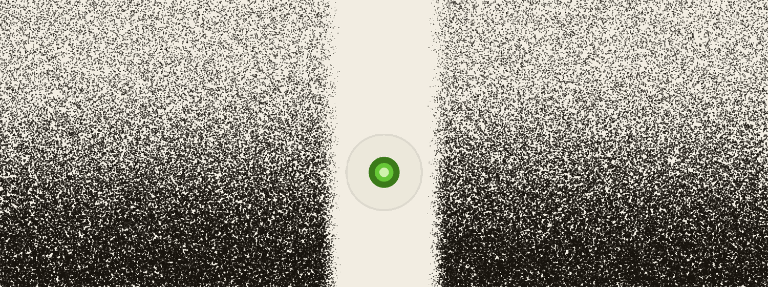 A dense field of dots split by a clean vertical channel of empty space, with a single green light held in the open channel.