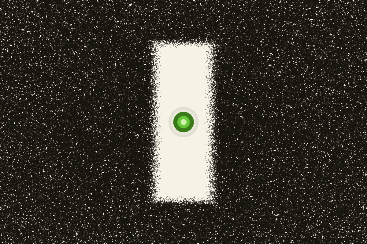 A dense field of dots carved by a clean clearing, one green light at its center.